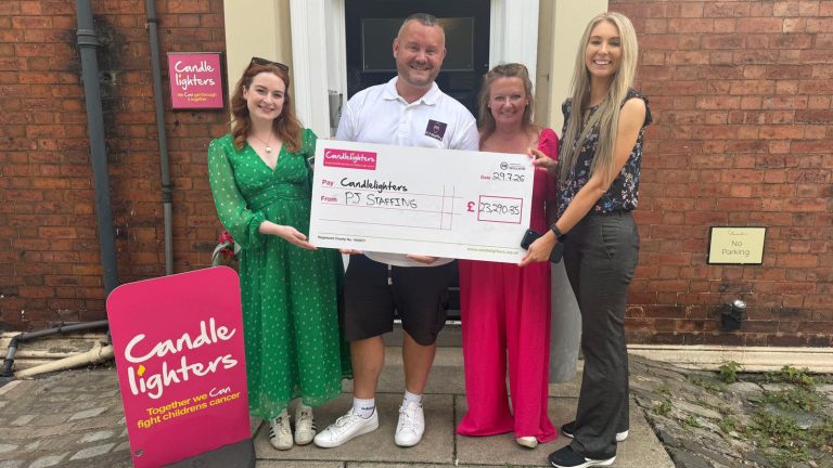 Paul McCallum presenting funds raised to Candlelighters.