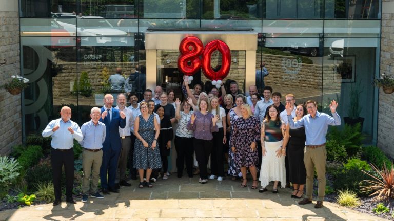 JCT600 colleagues celebrate the company’s 80th anniversary at the company's Bradford head office